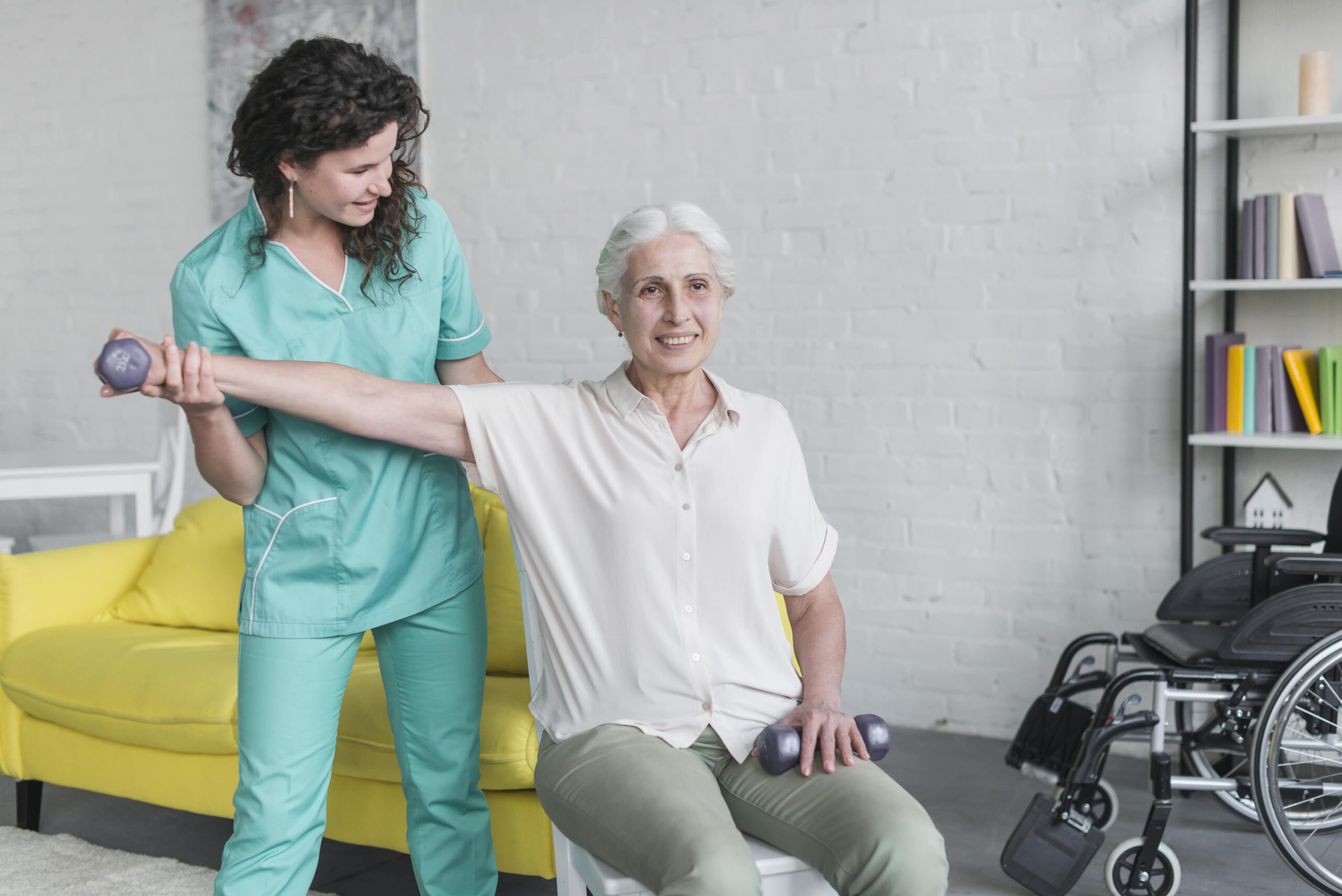 physiotherapist-working-with-elderly-patient-modern-clinic-min
